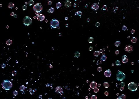 Bubbles on black background Stock Photos