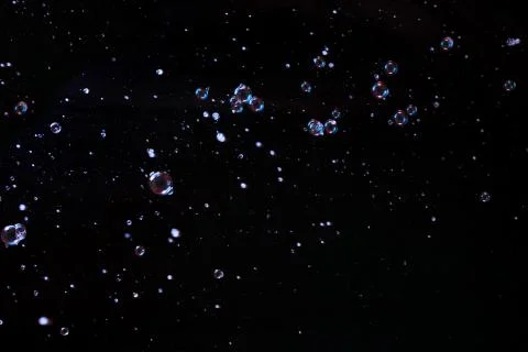 Bubbles on black background Stock Photos