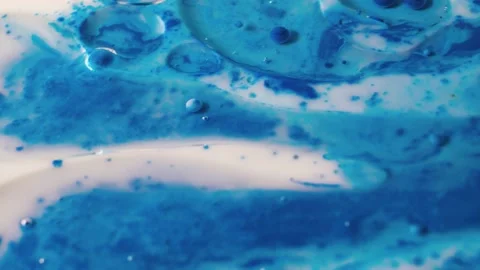 Bubbles of blue paint dissolve in water Stock Footage 171374254