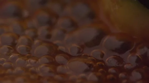 Bubbles of boiled liquid 스톡 동영상 64692402