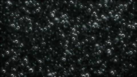Bubbles of carbon dioxide are rapidly crawling to the top. Depth of field. Deep Video stock 120847782