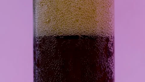 Bubbles of carbonated drink in a glass, macro, background screen saver, Stock Footage 236770510