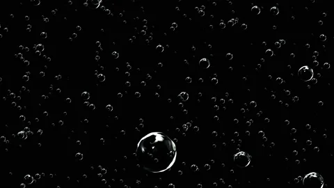 Bubbles of champagne on a black background. Stock Footage 110699180