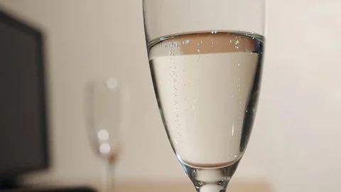 The bubbles of champagne in glass Stock Footage 71175581