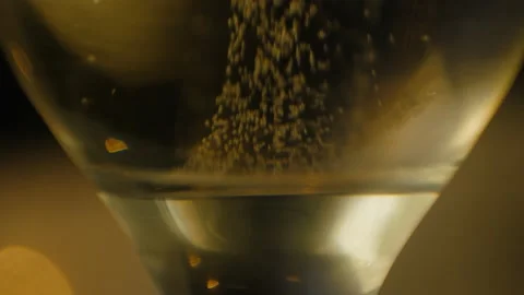 Bubbles In A Champagne Glass Stock Footage 169920729