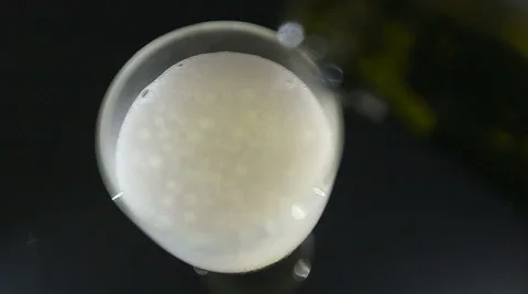 Bubbles in champagne.shot from above Stock Footage 61448443