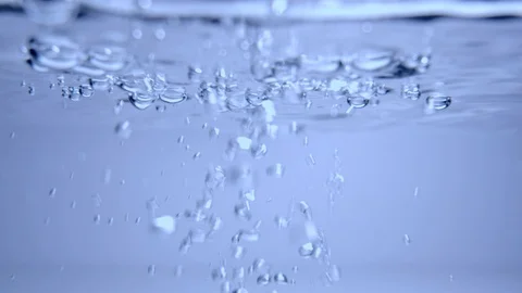 Bubbles in clear, fresh water. Inverted, slow motion. Stock Footage 116448741