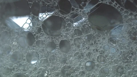 Bubbles close up macro isolated growing larger Stock Footage 119127542
