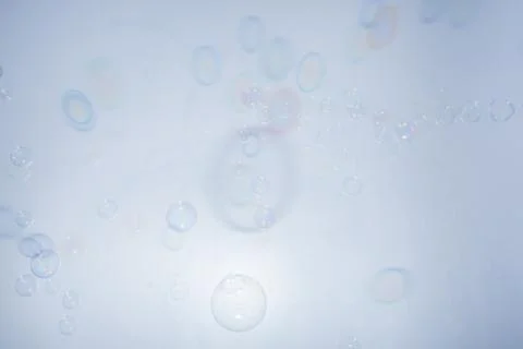 Bubbles colorful background white Stock Photos
