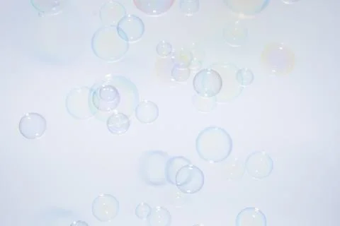 Bubbles colorful background white Stock Photos
