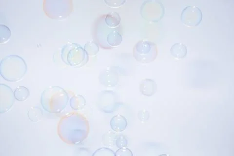 Bubbles colorful background white Stock Photos
