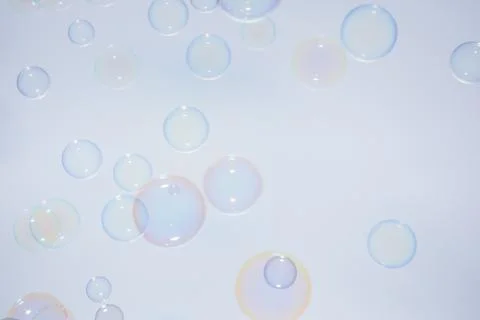 Bubbles colorful background white Stock Photos
