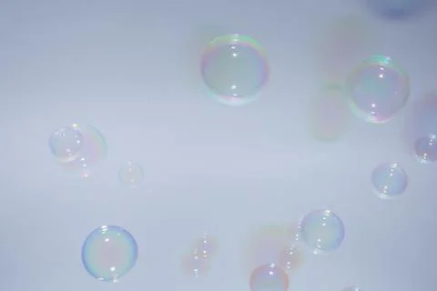 Bubbles colorful background white Stock Photos