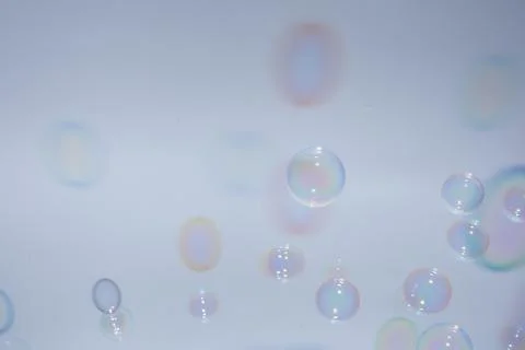 Bubbles colorful background white Stock Photos