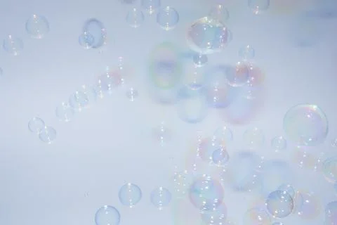 Bubbles colorful background white Stock Photos