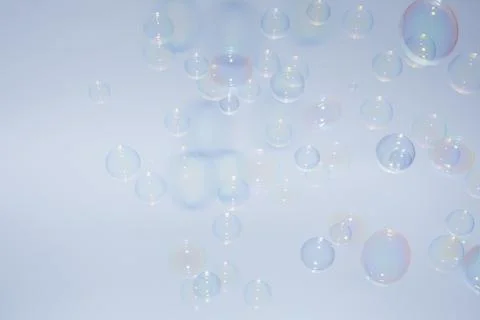 Bubbles colorful background white Stock Photos