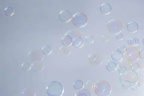 Bubbles colorful background white Stock Photos