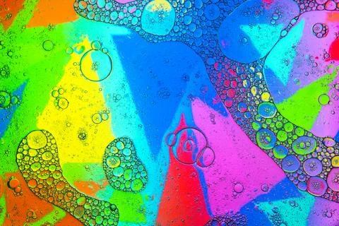 Bubbles on colorful psychedelic background Stock Photos