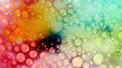 Bubbles of colorful, soap foam on a white background. Texture of Soap Foam Stock Footage 276994343
