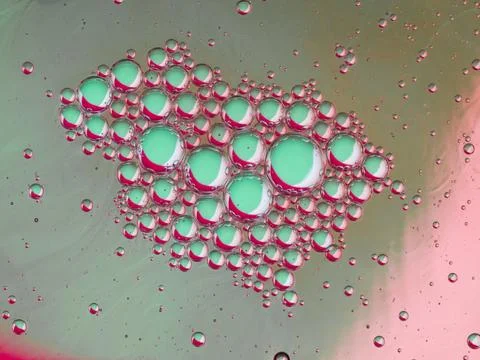 Bubbles come together Stock Photos