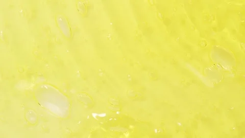 Bubbles cosmetics gel rotation, macro texture, beauty concept Stock Footage 310540236