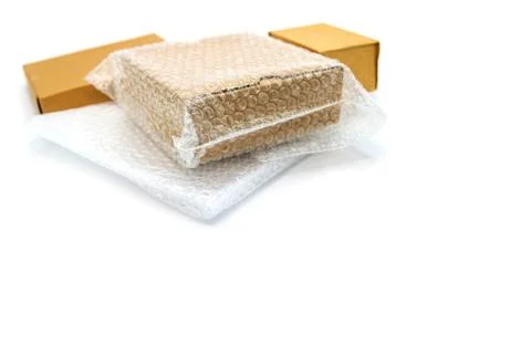 Bubbles covering the box by bubble wrap for protection product cracked 스톡 사진