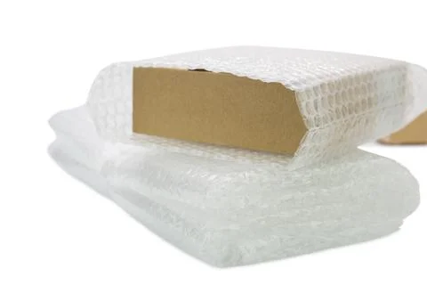 Bubbles covering the box by bubble wrap for protection product 스톡 사진