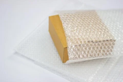 Bubbles covering the box by bubble wrap for protection product Stock Photos