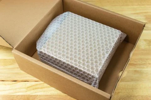 Bubbles covering the box by bubble wrap for protection product Stock Photos