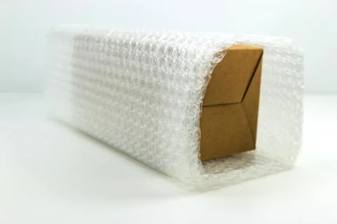 Bubbles covering the box by bubble wrap for protection product cracked white 스톡 사진