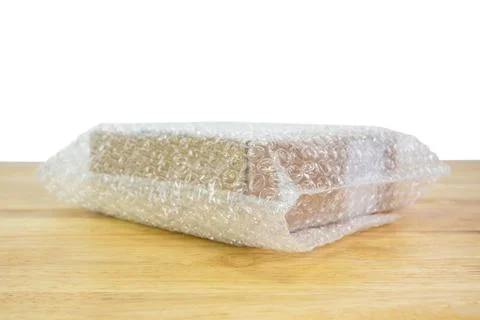 Bubbles covering the box by bubble wrap for protection product cracked 스톡 사진