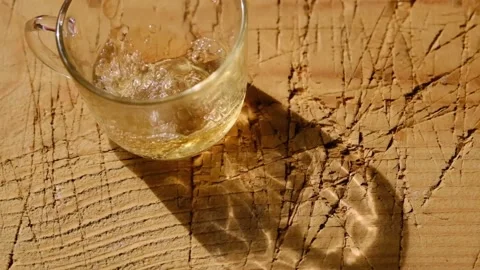 Bubbles created during filling of linden tea Stock Footage 151058771
