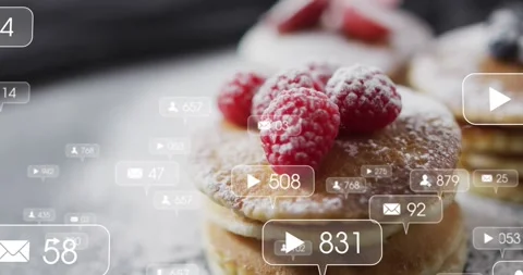 Bubbles entering frame, sugar dusting pancakes with 3 raspberries, counts rising Stock Footage 323336119