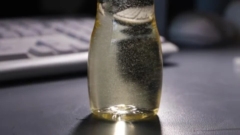 Bubbles in essential oil and alcohol diffuser liquid Video stock 336557615