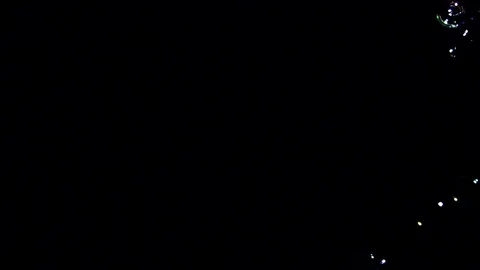 Bubbles falling against black background Stock Footage 82169242