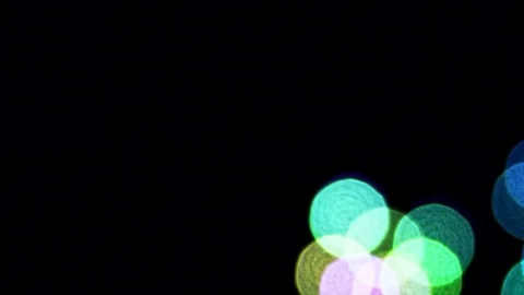 Bubbles falling against black background Stock Footage 82169479