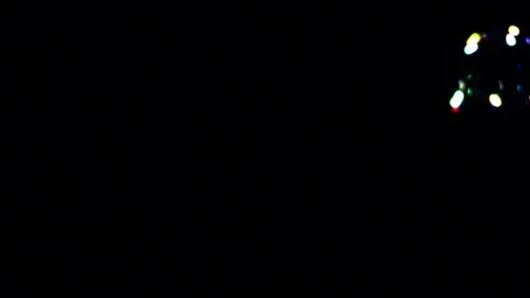 Bubbles falling against black background Stock Footage 82169652