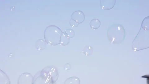 Bubbles float in the air Stock Footage 165285492
