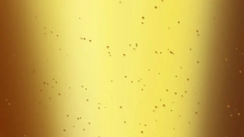 Bubbles float around the golden beer getting poured into a glass, 4K, Loop Stock Footage 276325889