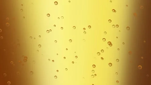 Bubbles float around the golden beer getting poured into a glass, 4K, Loop Stock Footage 276325937