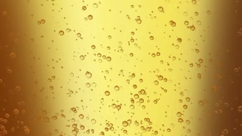 Bubbles float around the golden beer getting poured into a glass, 4K, Loop Stock Footage 276325971