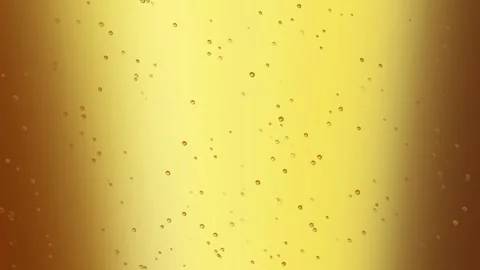 Bubbles float around the golden beer getting poured into a glass, 4K, Loop Stock Footage 276325972