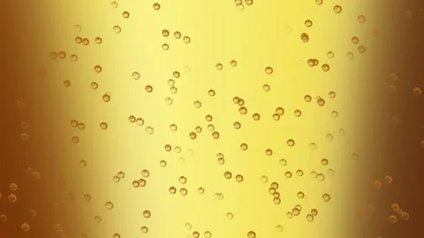 Bubbles float around the golden beer getting poured into a glass, 4K, Loop Stock Footage 276326033