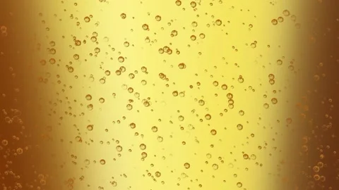 Bubbles float around the golden beer getting poured into a glass, 4K, Loop Stock Footage 276326042