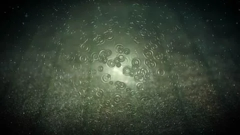 Bubbles float in dark water, resembling astronomical objects in a midnight event Foto stock