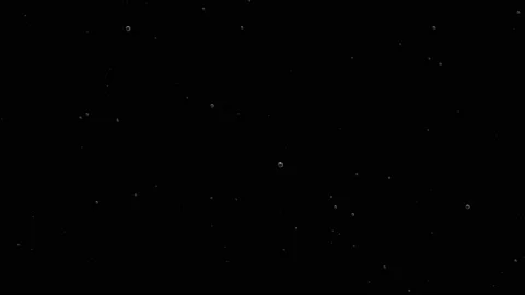 Bubbles float in different directions but pressure pulls them up.Extra Soda Stock Footage 103962595