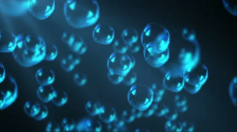 Bubbles float to the surface of blue water Stock Footage 63395555