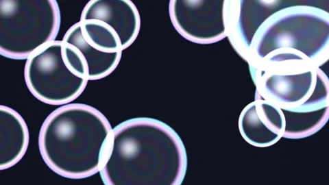 Bubbles floating in the air against a dark background Vídeo Stock 338100983