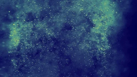 Bubbles floating in the amazing deep structured blue and teal liquid. Stock-Footage 79833256