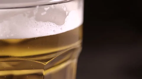 Bubbles Floating in Beer Glass Stock Footage 53039791
